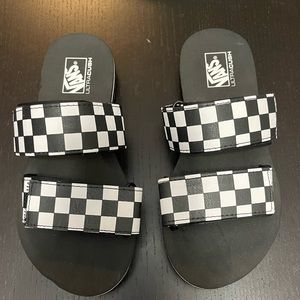 New Vans Black and White Checkered  Slides size 5. Checkered straps are velcro.